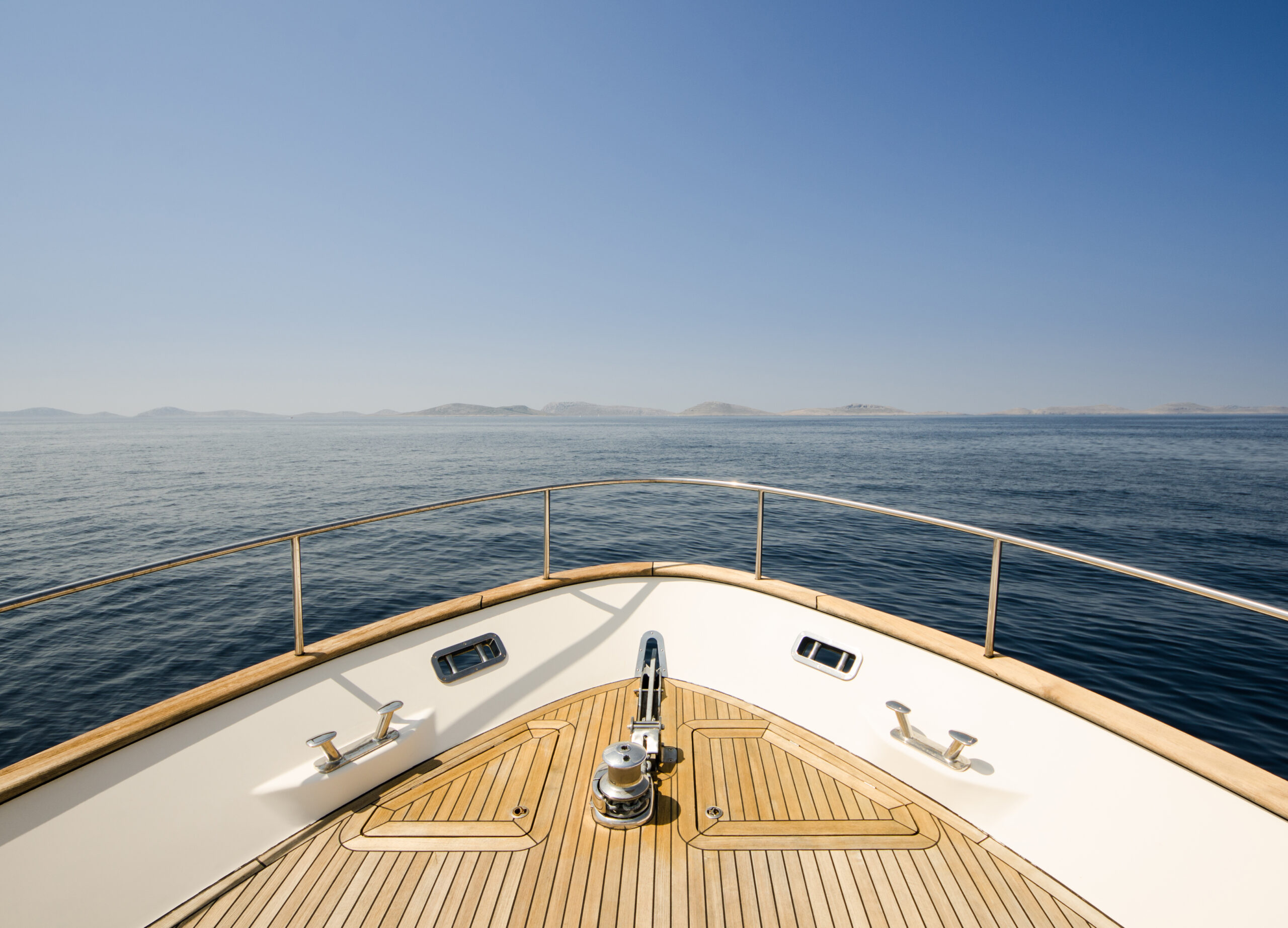 Wide angle shot of front of the yacht in summer time